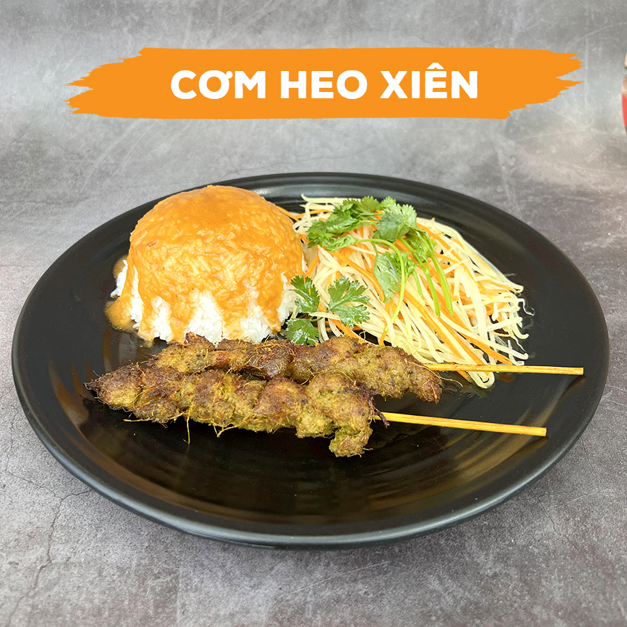 Cơm heo xiên chả nướng ngon giá bao nhiêu?